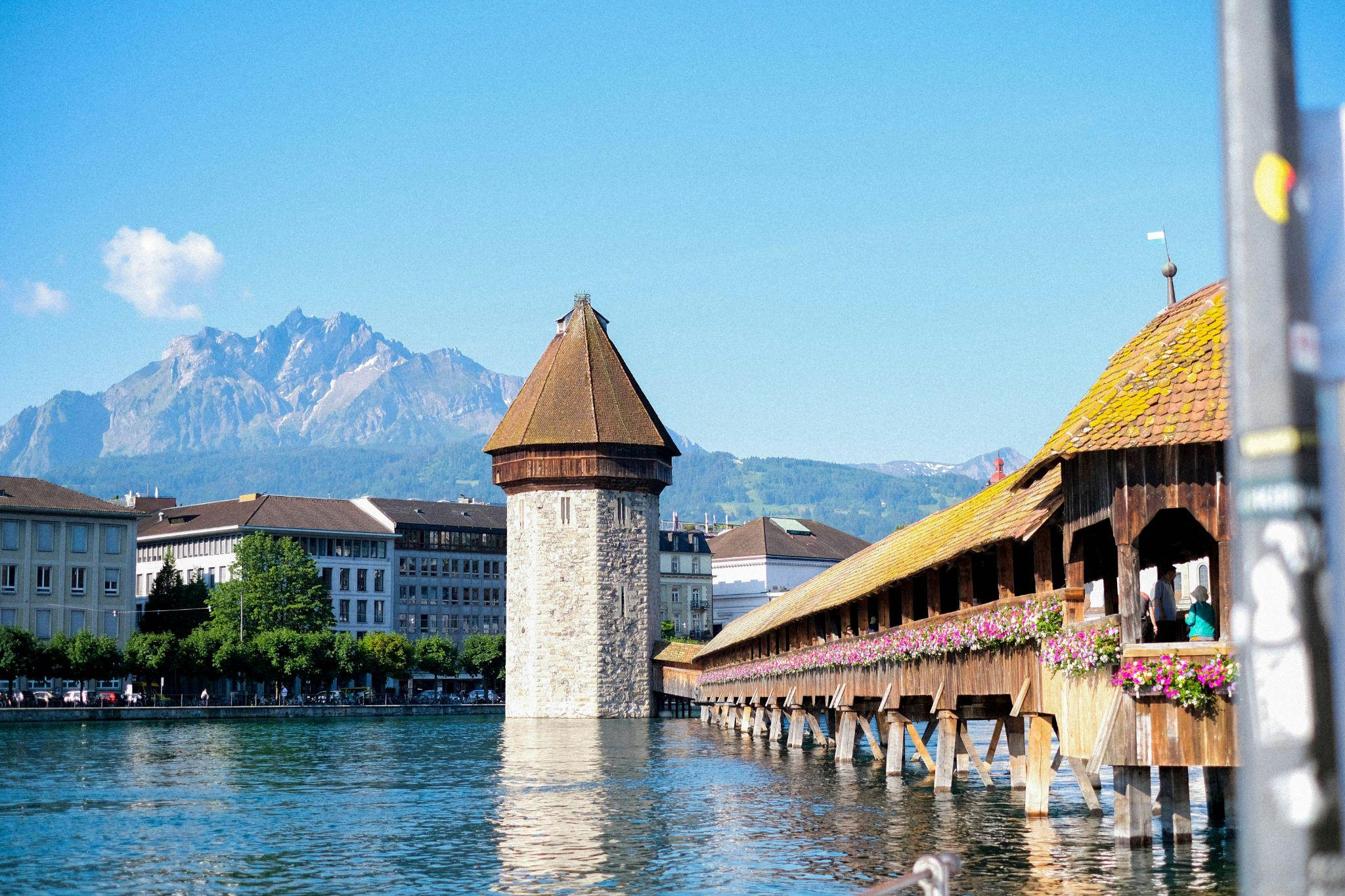 Chapel Bridge and Mount Pilatus overlooking Lake Lucerne, Switzerland.