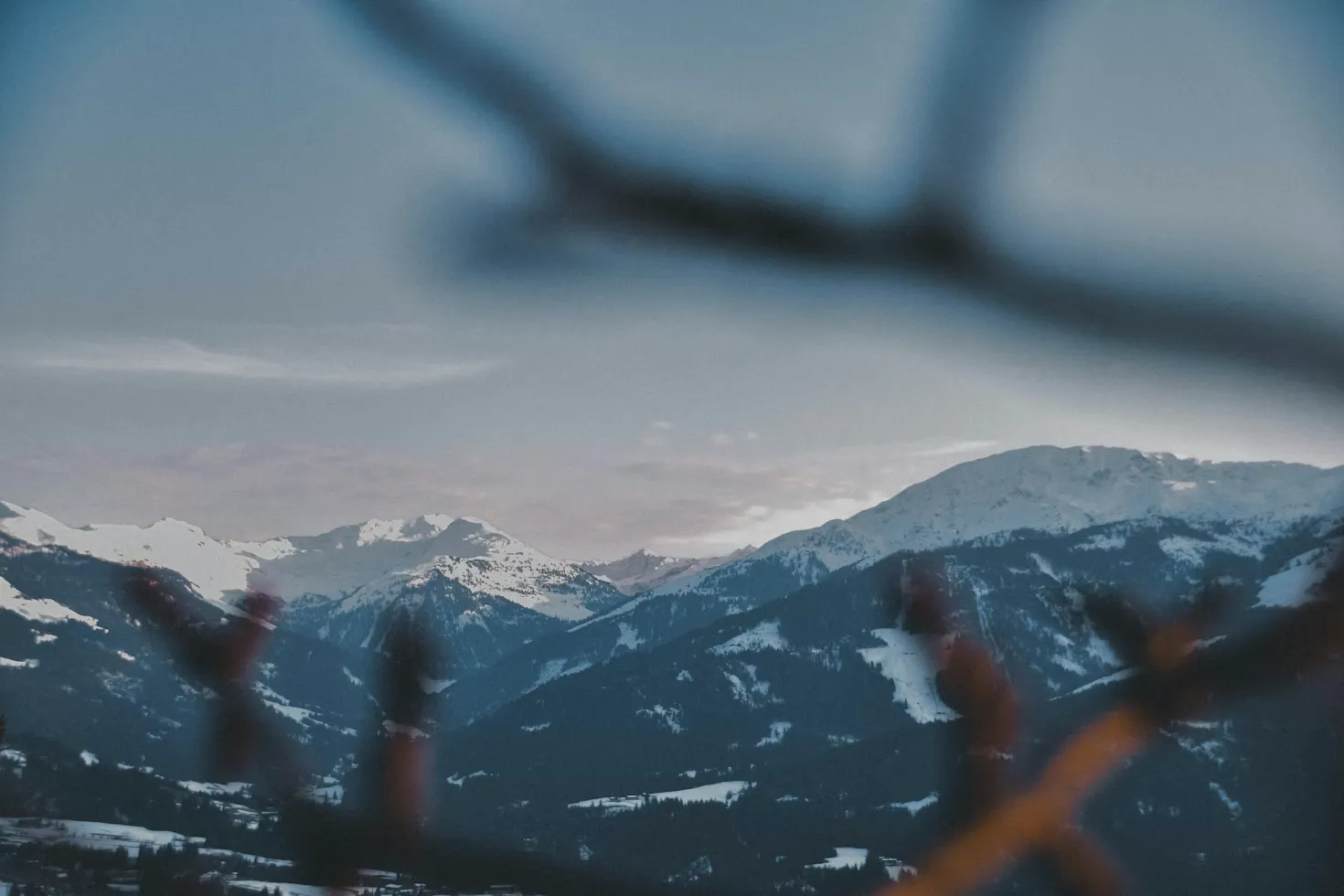 Snow-capped mountains surrounding the village of Westendorf, Austria.