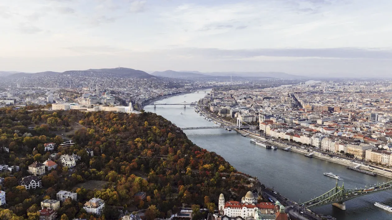 Aerial view of Budapest with the Danube River and bridges connecting the city.