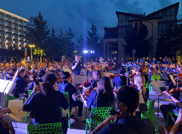 Student musicians share their talent with a live audience during a memorable international performance night.