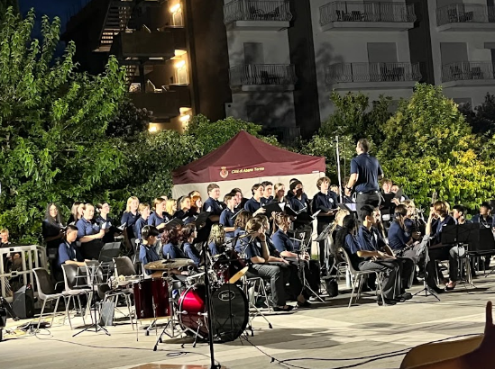Student musicians share their music with an international audience during a memorable evening concert experience that combines performance, teamwork, and cultural connection.