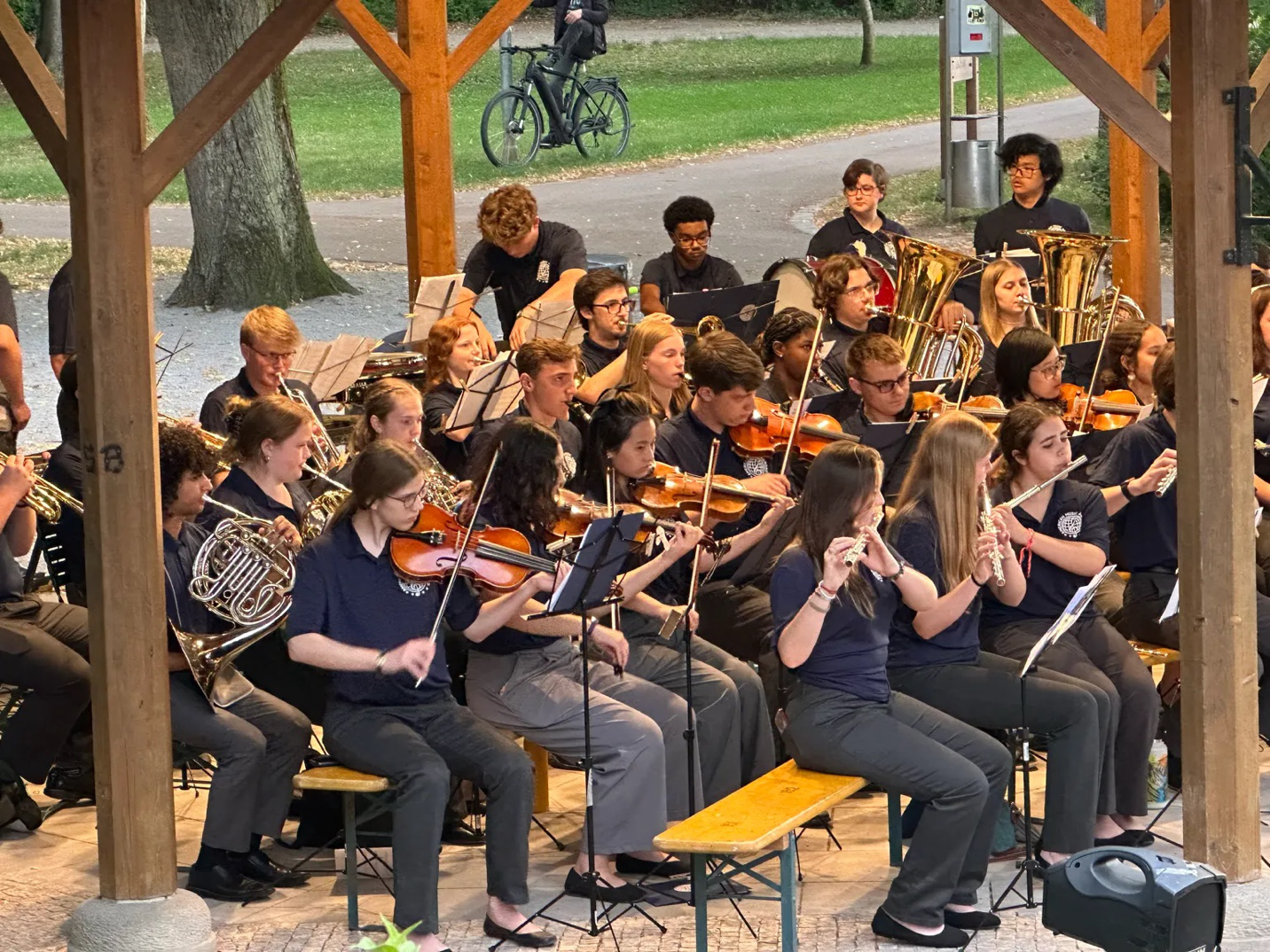 Performing in open-air venues across Central Europe allows student musicians to share their music with welcoming local audiences while building ensemble confidence.