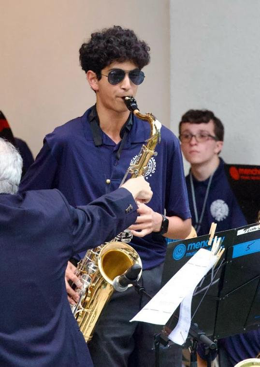 Performing alongside musicians from different schools gives young players a new perspective on teamwork and performing abroad.